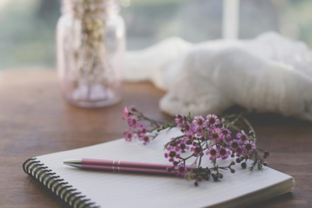 notebook and pen on the table